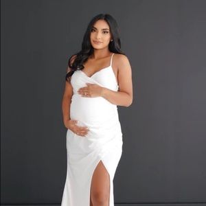 White floor length satin maternity gown.